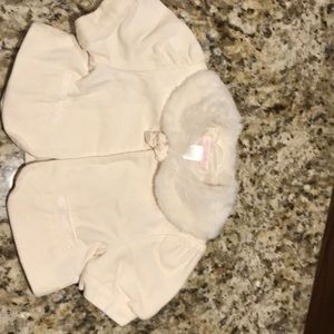 Velour cream colored with fake fur caplet.